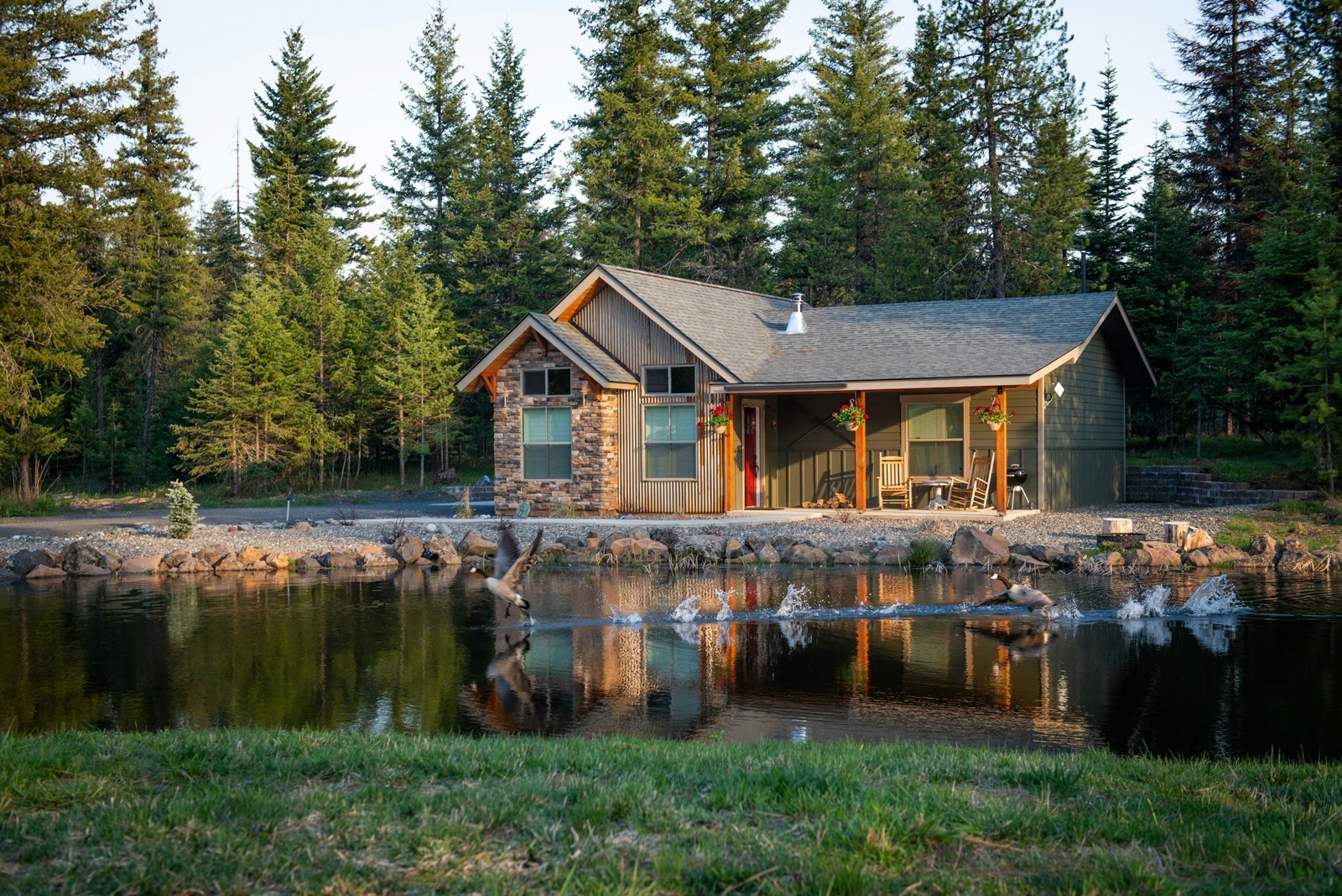 Mountain cabin short-term rental at dusk — RevFactor delivers expert dynamic pricing strategy for STR hosts